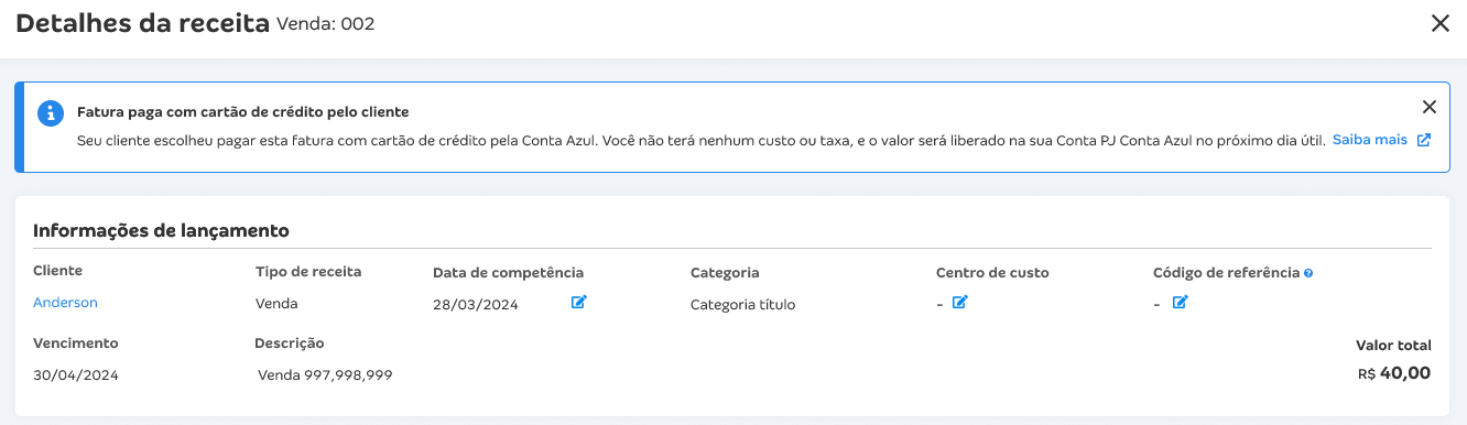 Tela do lançamento financeiro com destaque para a mensagem Fatura paga com cartão de crédito pelo cliente.